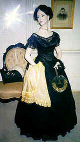 Mary Hamill's dress, with photo behind
