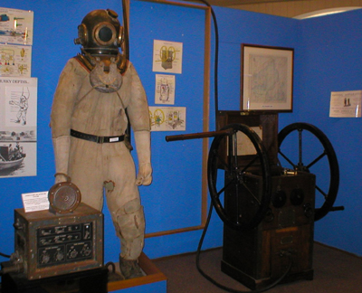 Diving suit including helmet, weights &amp; air supply