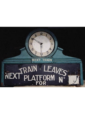 Train indicator board with clock used at Claremont Station.