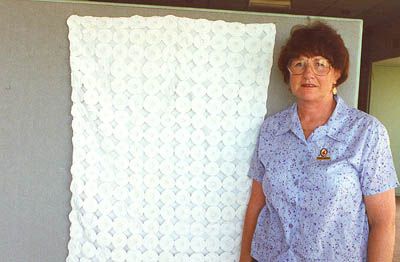 Pippa Savell with the quilt made for her mother-in-law as a baby.