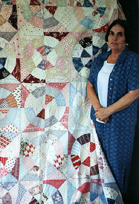 Rhona Dunwoodie with her mother's quilt.