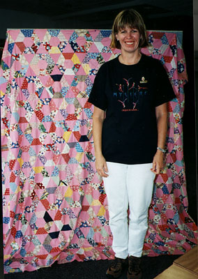 Nancy Dunlap with Margaret Doran's quilt.
