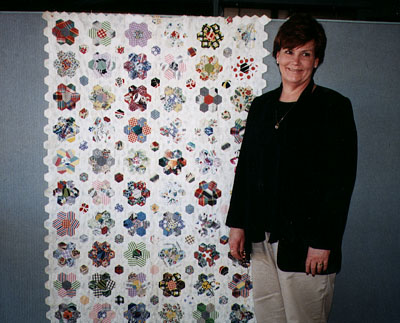 The owner Diane Boynes with her quilt