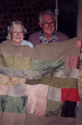 Bonnie Gilbert, brother Charles Craigie with quilt