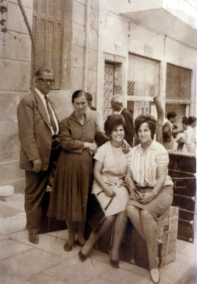 Maria (second from right) with friend and her parents. 1962