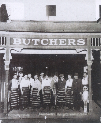 The butcher's shop showing the husband of the maker & their daughter