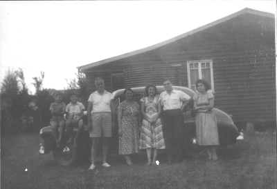 The Efstathis family outside their Queenslander house 1951