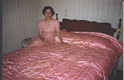 Connie Papalazaros with her quilt, 2000