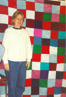 Mary Charlton with quilt.